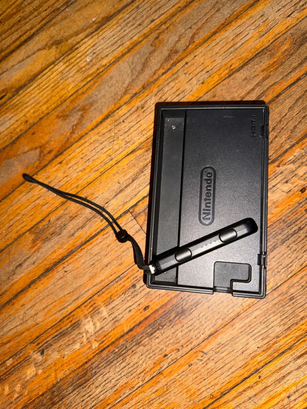 Nintendo Switch Block with joy-con strap.